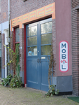 838240 Afbeelding van de muurreclames 'GARAGE' en 'MOBIL OIL', op de voor- en zijgevel van het pand Gruttersdijk 58 te ...